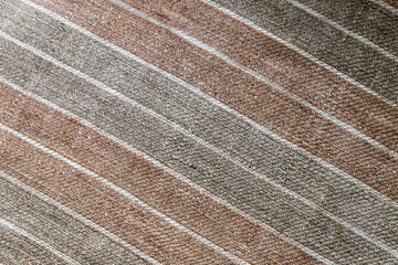 Gray red striped natural textile, background texture