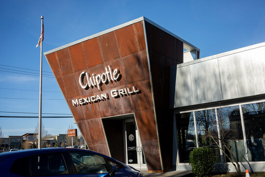 Beaverton, OR, USA - Jan 25, 2022: The Industrial-style Facade Of A Chipotle Mexican Grill Restaurant In Beaverton, Oregon. Chipotle Is An American Chain Of Fast Casual Restaurants.