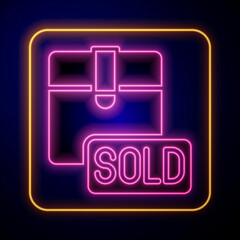 Glowing neon Sold icon isolated on black background. Vector