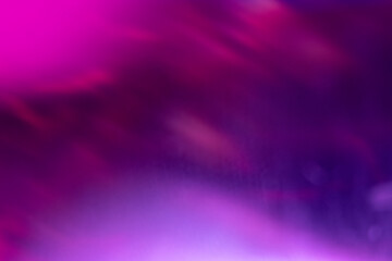 Blur sparks overlay. Bokeh light. Fluorescent fantasy glare. Defocused neon purple magenta pink blue color glow flecks texture on bright abstract background.