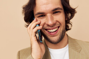 handsome man talking on the phone technologies Lifestyle unaltered
