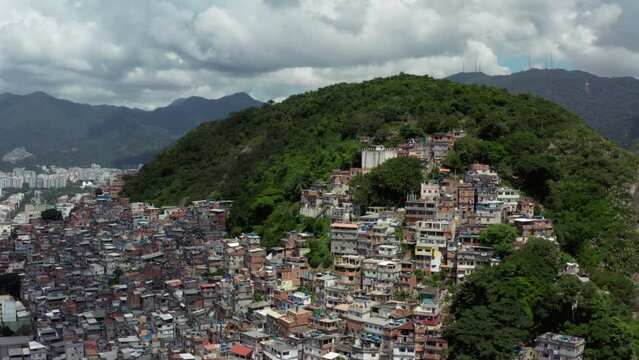 Aerial view Rio de Janeiro favelas Brazil. Slums with hills built on a mountain slope in Latin America in a landscape.
