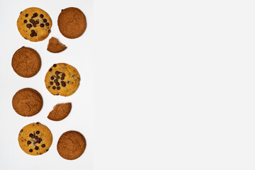 Homemade cookies with chocolate and nuts on a white background are highlighted with the composition.