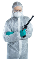 A man in a white suit and gloves in personal protective equipment holds a gun and looks at the camera. Precautions personal protection. Specialist is ready for protection. isolated