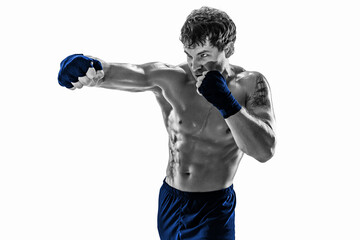 Studio shot of silhouette kickboxer who training practicing jab on white background. Blue sportswear - obrazy, fototapety, plakaty
