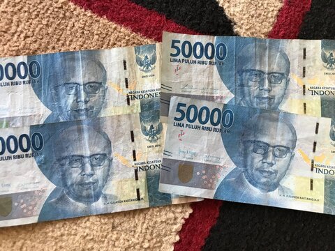 Indonesian rupiah for background. Indonesian rupiah banknotes series with the value of fifty thousand rupiah IDR 50.000