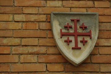 Manoppello - Abruzzo - Abbey of Santa Maria d'Arabona - Stone shield representing the coat of arms of the Equestrian Order of the Holy Sepulcher of Jerusalem.