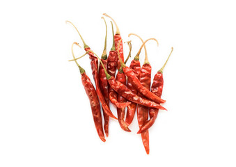 Isolated asian red and dry chillies pepper on white paper.