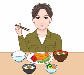 食事をしている若い男性