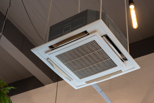 air condition hanging from ceiling. cassette type air conditioner.