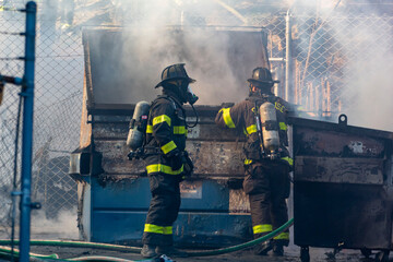 San Jose Fire Fighters putting out a fire in a dumpster