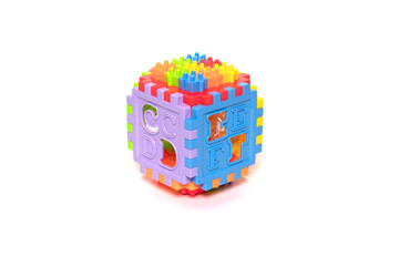 Fototapeta na wymiar Plastic cube toy isolated on white background.