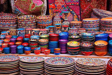 arabic design printed fancy clay plates and bowls in a street shop for sell