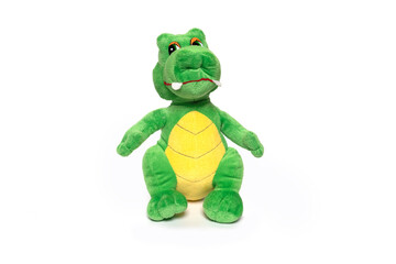Soft toy dragon isolated on white background.