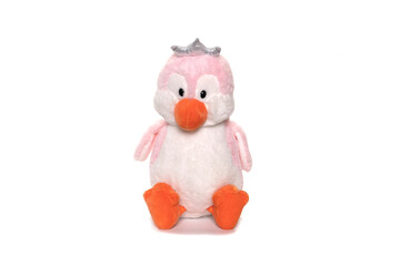 Pink plush penguin on white background.