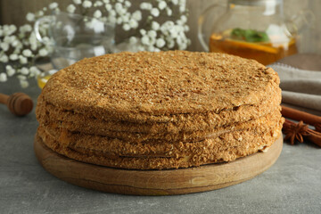 Concept of tasty dessert with honey cake, close up