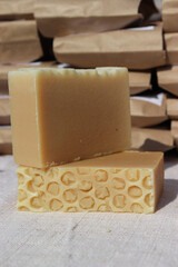 types of soap on wooden background