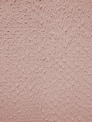 Rough blue plaster surface on the wall of the building. Plaster tecture close-up. Blue background.