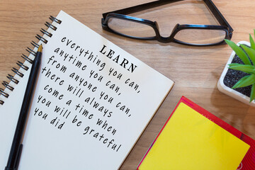 Motivational and inspirational quote on notepad. Learning concept
