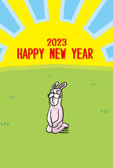 2023年　年賀状デザイン 座るウサギの着ぐるみを着た人物