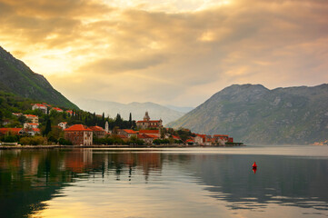 Evening landscape with houses and mountains in Kotor Bay, Montenegro