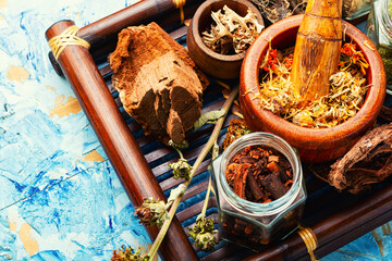 Tray with healing herbs.