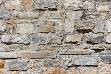 Grunge close up background. Stone wall texture.