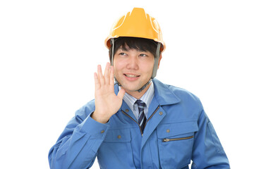 呼びかける男性労働者