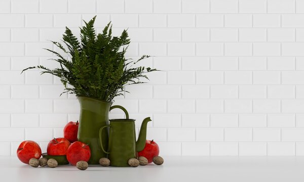 Kitchen decor. Bouquet of ferns in a green jug, apples and nuts. On the background of white tiles
