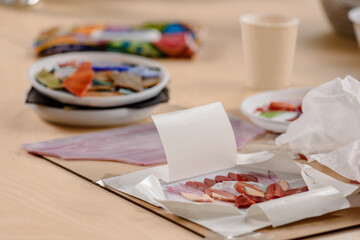 Workplace of mosaic maker, colorful material on wooden table