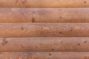 A hardwood aged wall background. Wooden brown texture of a natural tree.