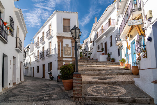 FRIGILIANA, SPAIN - January 28 2022: Situated in South of Spain, Frigiliana is a touristic travel destination, a village situated on the hills, with white houses, small roads. Typically Andalusian 