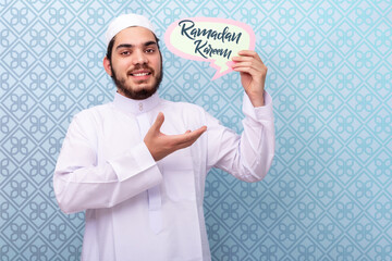 Young saudi man wishes for Ramadan Kareem.