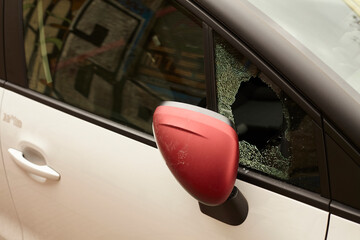 Broken car glass window theft