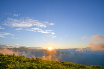 The sunrise shines with cloud and mist in mountains of Nagano in summer Japan.