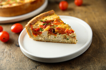 Homemade chicken quiche with tomatoes and pepper	