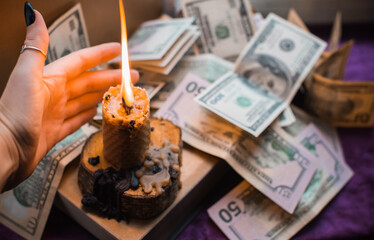 Ritual and spell for attracting money, pagan magic and fate prediction, work of witch, occultism concept
