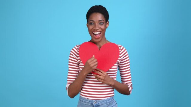 Excited trans person rejoice heart gift fist up isolated blue color background
