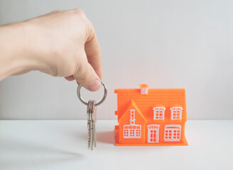 The concept of buying a house, a property, a key in hand.
life insurance concept.
