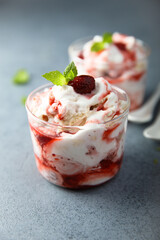 Homemade meringue dessert with raspberry and cream