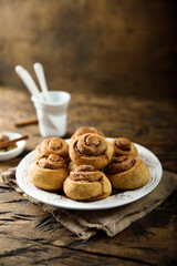 Homemade cinnamon rolls on a white plate