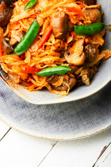 Cabbage stewed with mushrooms.