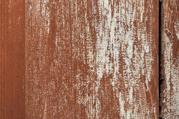 The boards were once painted with a light brown color, under the influence of the environment, the paint lost color and burned out in places, a natural texture was obtained