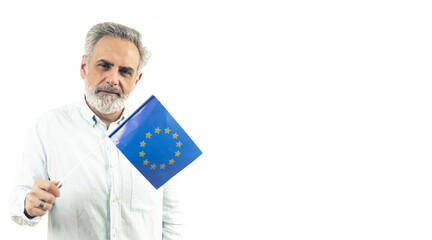 Middle-aged enterprenuer holding an EU flag - isolated white background. High quality photo