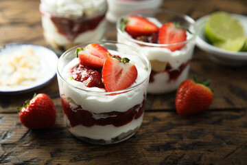 Homemade berry trifle with almond flakes