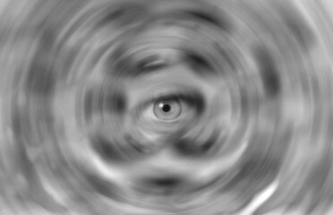 Weird psychedelic background made out of eyes in a circle of motion