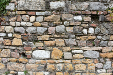 Fragment of ancient wall in Lyon, France as background
