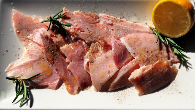 Ham or pork shoulder on a white rectangular plate