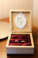 Wedding rings in a box. Bride morning. 