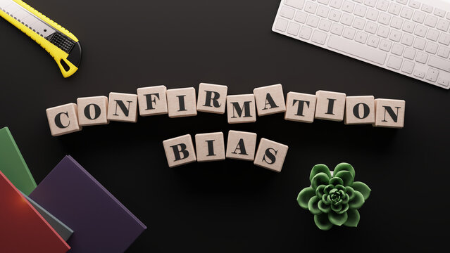 Confirmation bias concept, letter blocks on table
